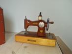 Oude kindernaaimachine, Ophalen