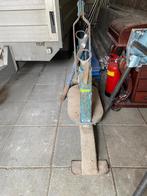 Knipmachine voor straatwerk, Ophalen