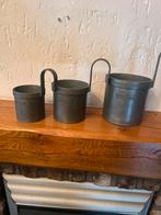 3 tinnen bekers, Ophalen