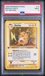 PSA 9 - Raichu Holo #14 1st Edition (1999 Pokemon Fossil), Ophalen of Verzenden, Zo goed als nieuw