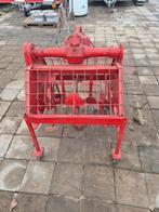 Grondfrees voor tractor, Ophalen