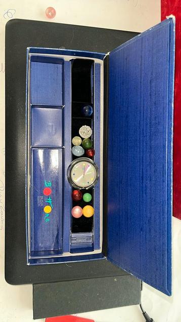 Swatch horloge  “ Bottone “ beschikbaar voor biedingen