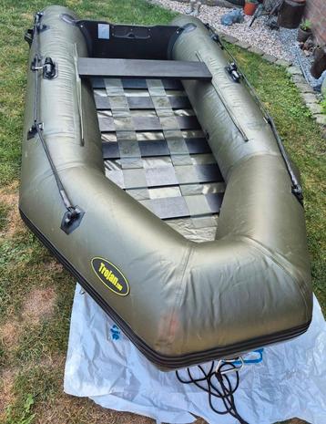 Trojan 290 opblaasbare rubberboot met buitenboordmotor beschikbaar voor biedingen
