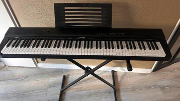 Keyboard met standaard en koptelefoon functie beschikbaar voor biedingen