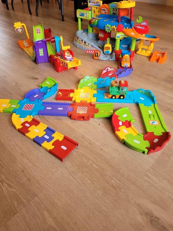 VTech Toet Toet Garage, extra baan+ Looping, Kinderen en Baby's, Speelgoed | Speelgoedvoertuigen, Gebruikt, Ophalen