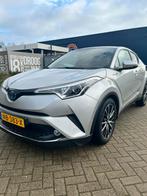 Toyota CHR 1.8 Hybrid Executive StoelVer/Navi/Led, Auto's, Origineel Nederlands, Te koop, 98 pk, Zilver of Grijs