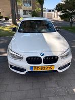 BMW 1-Serie 118i 136pk Aut 2017 Wit, Auto's, 65 €/maand, Wit, Bruin, 650 kg