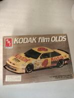 AMT Kodak Film Olds Modelauto 1/25, Hobby en Vrije tijd, Modelbouw | Auto's en Voertuigen, Ophalen of Verzenden, Gebruikt, 1:32 tot 1:50