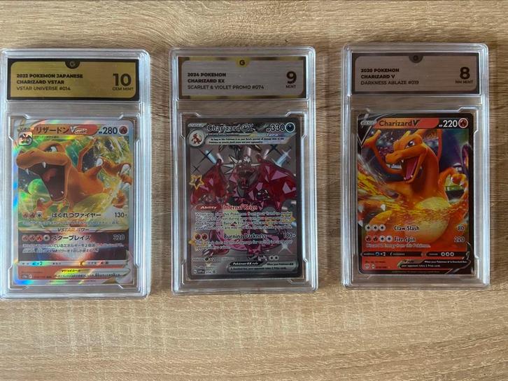 Pokemon Charizard kaarten graded - Global Grading, Hobby en Vrije tijd, Verzamelkaartspellen | Pokémon, Nieuw, Meerdere kaarten