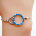 Zilveren ring en armband met opaal, Gebruikt, Verzenden, 17 tot 18, Nvt