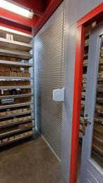 Roldeur 3m hoog 2,7 m breed handbediening, Ophalen