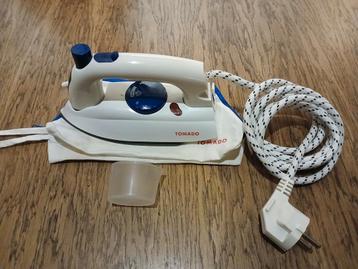 Tomado reissrtijkijzer met stoomfunctie.  beschikbaar voor biedingen