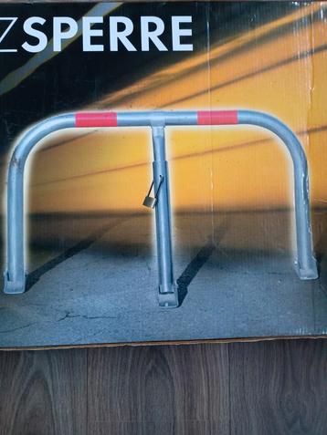 PARKEERPLAATS- / OPRITBLOKKERING. Nieuw in de verpakking beschikbaar voor biedingen