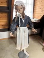 Antieke etalage pop, Ophalen