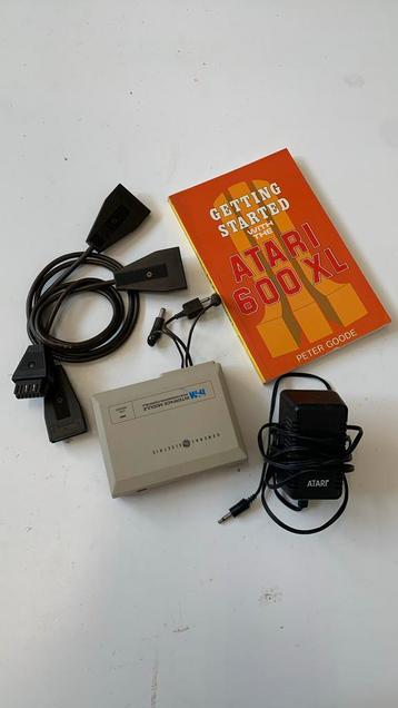 Lotje Atari onderdelen en boek beschikbaar voor biedingen