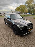 BMW X1 Sdrive 18I AUT 2010 Zwart, Auto's, Achterwielaandrijving, 1995 cc, 4 cilinders, Zwart