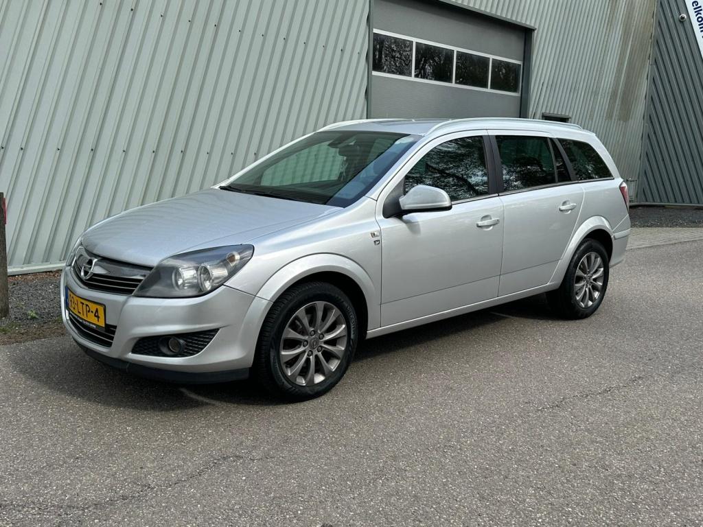 Opel Astra Wagon 1.4 111 y. Ed. (bj 2010), Auto's, Gebruikt, Origineel Nederlands, 1364 cc, Lichtsensor