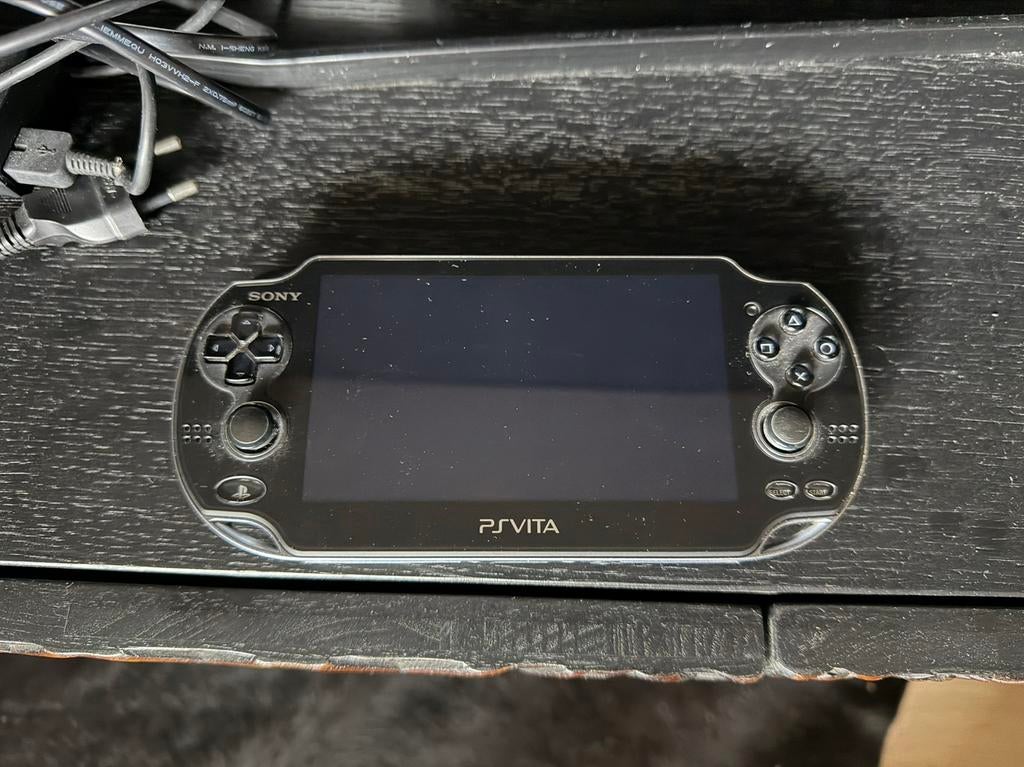 PS Vita Oled met 1 game, Spelcomputers en Games, Ophalen, Zo goed als nieuw, Zwart, Met camera
