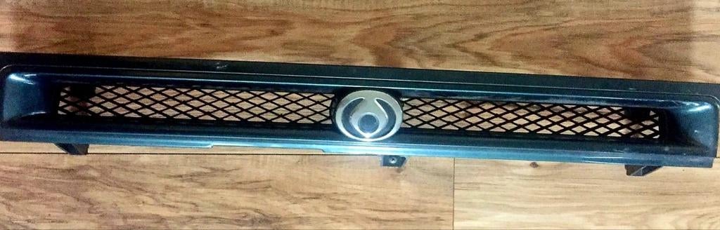 Mazda 323 grill  blauw bw-j 90 - 96, Ophalen, Voor, Nieuw, Mazda