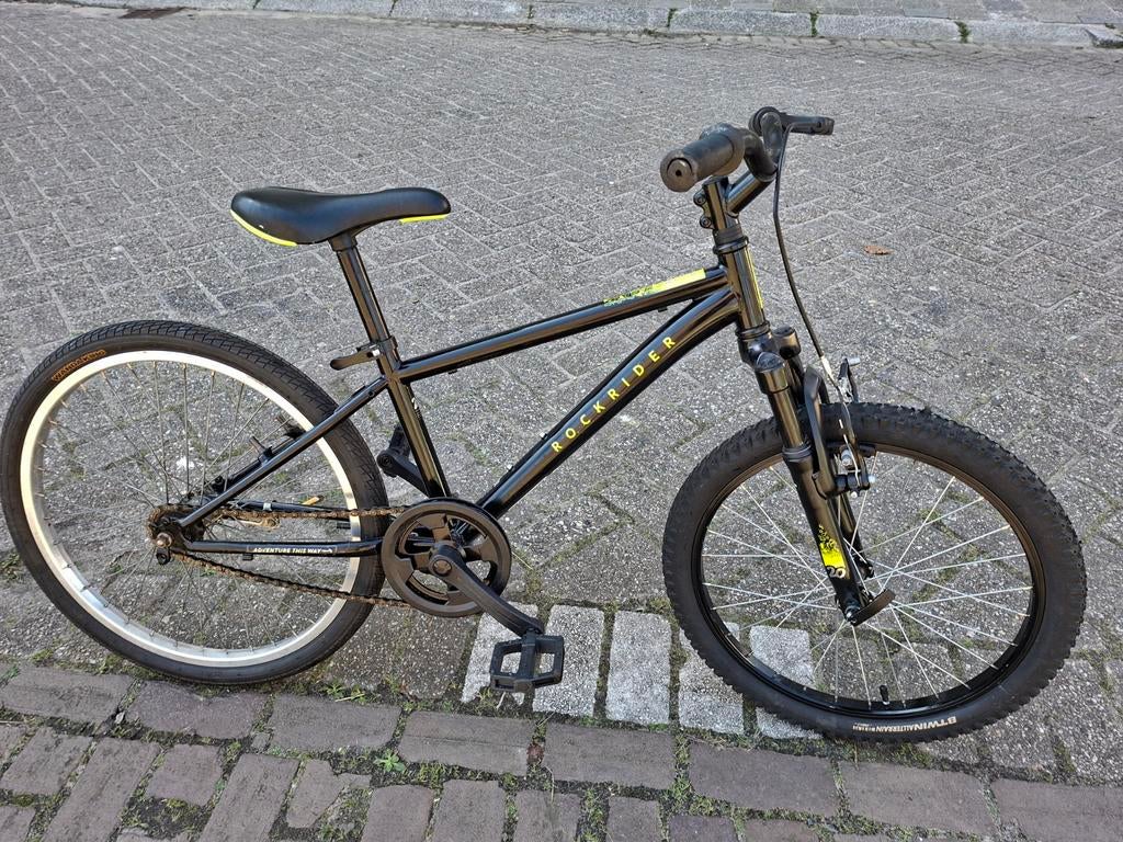 Rockrider mountainbike, zwart met geel((vaste prijs)), Fietsen en Brommers, Fietsen | Mountainbikes en ATB, Heren, Zo goed als nieuw