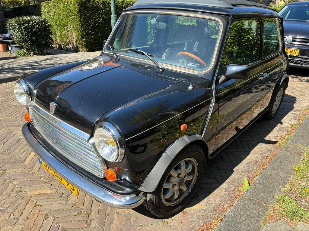 Rover Mini 1.3 I E2 1993 Zwart, Auto's, Rover, Voorwielaandrijving, 53 pk, 4 cilinders, Leder en Stof