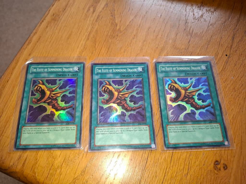 The Flute of Summoning Dragon SDK Super Rare PL (3 kaarten), Ophalen of Verzenden, Gebruikt, Meerdere kaarten, Foil