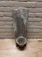 Bloempot op dakpan, Ophalen