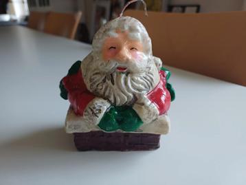 Oude kerst kaars kerstman uit schoorsteen  beschikbaar voor biedingen