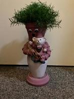 Poppetje met kunstplantje, Ophalen, Binnen