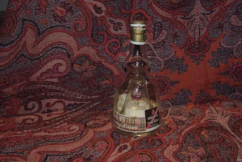 fles met speeldoos/spaarvarken/graanmolen/blaasbalg/, Antiek en Kunst, Curiosa en Brocante, Ophalen of Verzenden