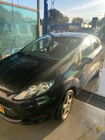 Ford Fiësta 1.25 44KW 5DR 2010 Zwart, Auto's, Ford, Voorwielaandrijving, Stof, 1242 cc, Zwart