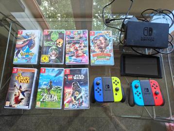 Nintendo Switch + 2 Joy-Cons en Charging grip + 13 spellen beschikbaar voor biedingen