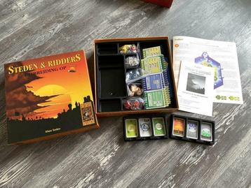 Z.G.A.N. uitbreiding: Steden en Ridders Kolonisten van Catan beschikbaar voor biedingen