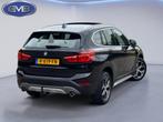 BMW X1 SDrive20i 192 pk High Executive, panoramadak, trekhaa, 1998 cc, Euro 6, Leder en Stof, Zwart