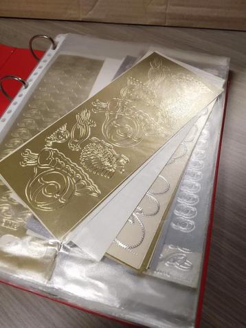 Zelfklevende applicaties in goud en zilver beschikbaar voor biedingen