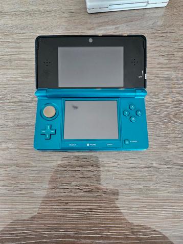 Blauw 3ds met oplader en 4 originele spellen