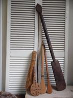 stoere donkere hardhouten peddel of schep, Ophalen