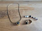 Melano ketting en ring met 8 steentjes, IJzer of Staal, Ophalen of Verzenden, Dame, Goud