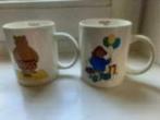 2 bekers/ mokken Douwe Egberts Paddington bear 2009, Huis en Inrichting, Keuken | Servies, Ophalen of Verzenden, Nieuw, Overige stijlen