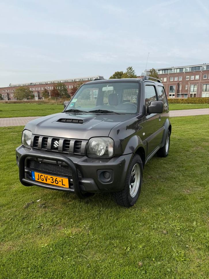 Suzuki Jimny 1.3 4x4 2015 /118.536 km, Auto's, Suzuki, Jimny, Benzine, SUV of Terreinwagen, Handgeschakeld, Geïmporteerd, Zilver of Grijs