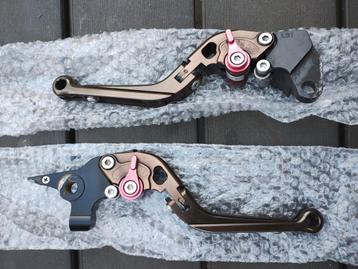 Hendels, handles voor i.i.g. Yamaha MT03 660. Bronskleurig beschikbaar voor biedingen