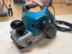 Bandschuurmachine Makita, Doe-het-zelf en Verbouw, Gereedschap | Schuurmachines, Ophalen of Verzenden, 600 tot 1200 watt, Bandschuurmachine