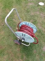 tuinslanghaspel en tuinslang, Ophalen, Gebruikt, Tuinslang