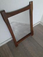 Spiegel met houten rand, Ophalen