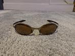 Oakley E wire gen 2 gold iridium, Sieraden, Tassen en Uiterlijk, Zonnebrillen en Brillen | Heren, Gebruikt, Zonnebril, Overige kleuren