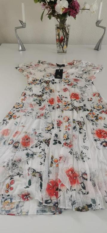 Nieuwe, elegante  zomerjurk beschikbaar voor biedingen