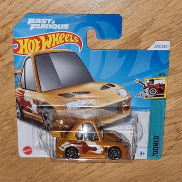 600 - Hotwheels Tooned Toyota Supra in verpakking.  beschikbaar voor biedingen
