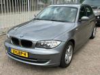 BMW 1-serie 118i Business Line - Motorschade (bj 2010), Auto's, BMW, 1-Serie, 65 €/maand, Achterwielaandrijving, Elektrische ramen