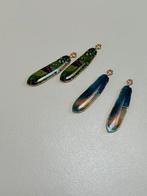 Vier bedels hangers veertjes, Ophalen of Verzenden, Nieuw, Overige materialen, Overige merken