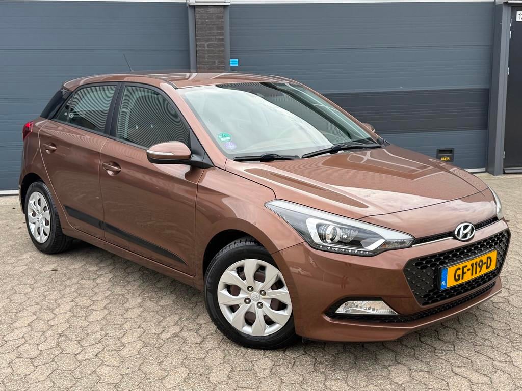 Hyundai I20 1.2 HP i-Motion|AIRCO|CRUISE|NAP|NIEUWE APK, Auto's, Gebruikt, 4 cilinders, Bruin, Bedrijf